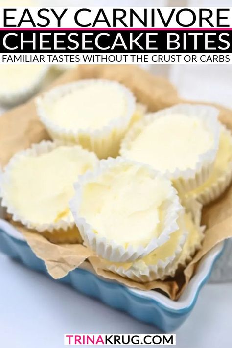 A blue dish holds several Easy Carnivore Cheesecake Bites, the perfect low-carb snack. They rest on brown parchment paper, while a few more carnivore cheesecake bites are visible in the background on a white surface. Carnivore No Bake Cheesecake, Carnivore Cream Cheese Dessert, Carnivore Pumpkin Cheesecake, Carnivore Diet Cheesecake, Carnivore Diet Treats, Carnivore Pumpkin Pie, Carnivore Diet Dessert Recipes Easy, Carnivore Sweet Snacks, Carnivore Diet Sweet Snack