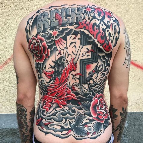 Rock Of Ages back piece tattoo done by @uptown_danny | www.otzi.app Traditional Backpiece, Austria Tattoo, Traditional Tattoo Back Piece, Rock Of Ages Tattoo, Traditional Black Tattoo, Sailor Tattoos, Peacock Tattoo, Realistic Tattoo Sleeve, Back Piece Tattoo