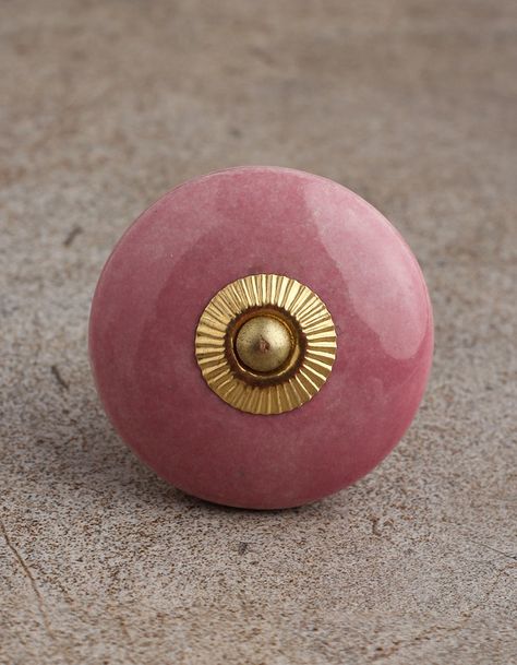 Solid Pink Ceramic door knob is the perfect choice to give the descent and elegant look you wish to have for your room.It is perfectly suitable for any cabinet or drawer in your kitchen, bathroom or even your dressing. Being handmade it gives you a very personal and elegant appearance to your drawers or cabinets. These uniquely crafted ceramic knobs are 5.59 cm in diameter and also includes screws for easy installation of the knob. There are four different backings available which are Silver Sil Colorful Knobs, Bathroom Knobs, Ceramic Cabinet, Ceramic Door Knobs, Printed Tile, Wedding Mugs, Wooden Knobs, Interior Accents, Pink Ceramic