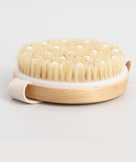 Dry Brushing is the Best-Kept Secret to Smooth Skin-Here's How It Works | Because of its small size, this dry brush is great for traveling. Plus, this option features beads built into the bristles, which add extra massaging for your skin.  #beautyhacks #skincare #realsimple #drybrushing Body Dry Brush, Exfoliate Brush, Body Exfoliator Brush, Dry Body Brush, Exfoliating Body Brush, Shower Brush, Skin Care Routine For 20s, Dry Body Brushing, Exfoliating Brush