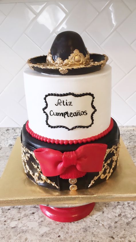 This stunning mariachi cake was created for a 15th Birthday Party. Mariachi sombrero was made out of rice crispy treats. #15años #mariachicake #pasteldemariachi #mariachi #fiestamexicana #mexicanwedding #mexicanparty #mexicanfiesta #greensboronc Mariachi Party Ideas, Mariachi Cake Ideas, Charro Cake Ideas, Mariachi Birthday Party, Mariachi Party Theme, Charro Birthday Party Ideas Boy, Charro Birthday Party, Charro Cakes, Mariachi Cake