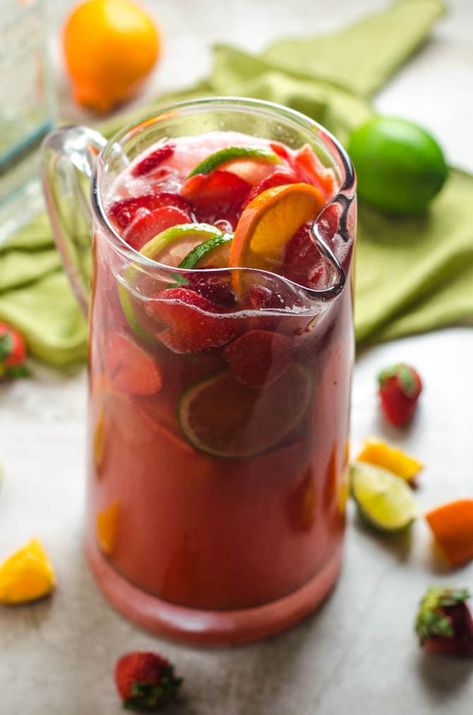 Strawberry Sangarita (Margarita Sangria) - Host The Toast Sangarita Recipe, Lake Drinks, Wine Recipes Drink, Margarita Sangria, Leftover Strawberries, Rose Sangria, Healthy Cocktails, Sangria Recipe, Make Lemonade