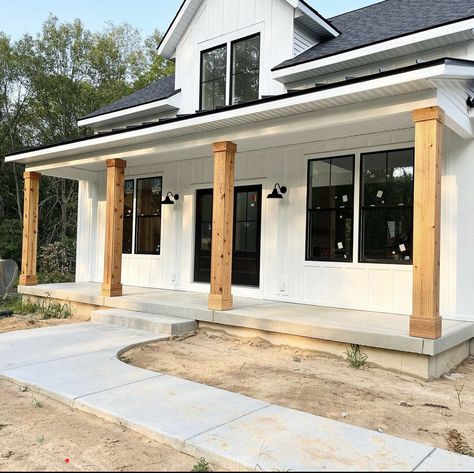 White Tin Siding House, Front Porch Builds, Front Porch With Metal Roof, White Exterior House With Wood Accents, White Modern Farmhouse Exterior, Farmhouse Siding, Exterior Farmhouse Ideas, Cozy Homestead, Exterior Refresh