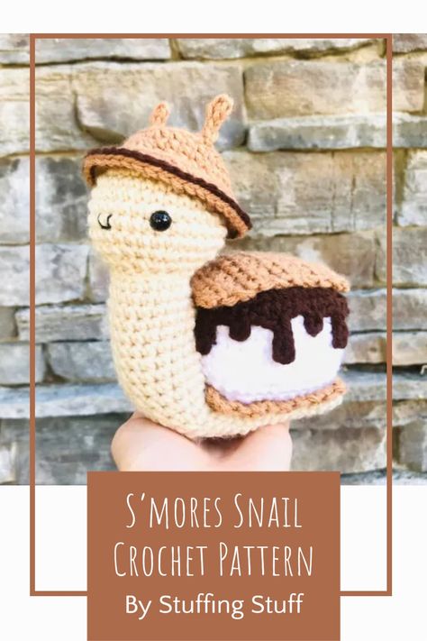 I don't think I’ve ever seen a cuter snail than this S’mores Snail Crochet pattern from Stuffing Stuff! This easy-to-follow pattern contains 8 pages, over 55 step-by-step photos, and has been tested by a team of pattern testers to ensure clarity! Finished size: 6 in / 15 cm tall, 6 in / 15 cm long. Paid pattern by Stuffing Stuff! How To Crochet A Snail, S'more Crochet Pattern, Smores Crochet, Summer Crochet Amigurumi, Crochet Smores, Crochet Arigami Patterns Free, Crochet Snail Pattern Free, Snail Crochet Pattern Free, Stuffed Animal Crochet Patterns Free