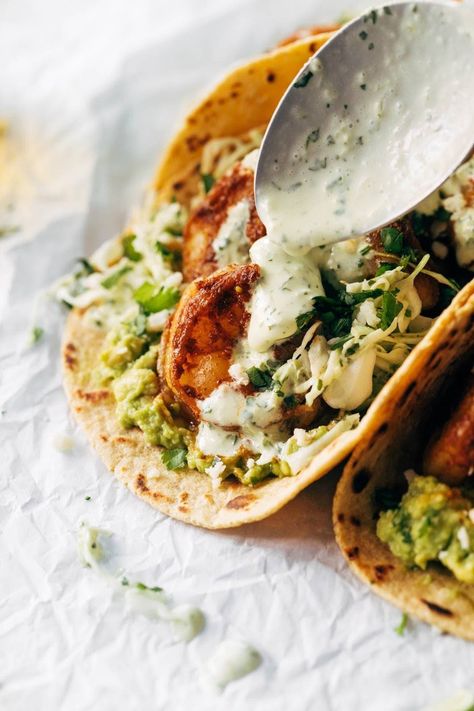 The Best Shrimp Tacos with Garlic Cilantro Lime Slaw - ready in about 30 minutes and loaded with flavor and texture. SO YUM! #tacos #tacotuesday #shrimp Peper Steak, Best Shrimp Tacos, Lime Slaw, Tacos Recipes, Spicy Shrimp Tacos, Cilantro Lime Slaw, Shrimp Taco Recipes, Cilantro Lime Sauce, Lime Sauce