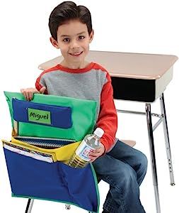 Includes 6 Deluxe Multi Pocket Chair Pockets, 6 removable pencil cases and 6 name tags. Really Good Stuff Deluxe Multi-Pocket Chair Pockets help students organize. Made of durable water resistant fabric, our chair pocket organizer is 16" x 19" (inside large pocket width 16" x 13" deep, medium pocket width 11" x 11" deep, small pocket width 5" x 11" deep. Classroom Chair Covers, School Chair Pockets, Seat Sacks, Classroom Organization Hacks, Chair Pockets, Classroom Chair, Kindergarten Classroom Ideas, Flexible Seating Classroom, Sewing Corner