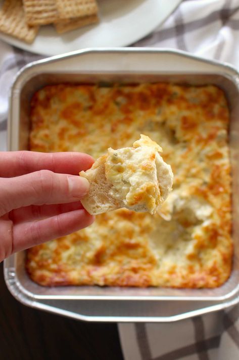 Paula Deen's Artichoke Dip?utm_source=12tomatoes Taste Of Home Spinach Artichoke Dip, Cheesy Garlic Herb Dip 12 Tomatoes, Paula Deen Artichoke Dip, Paula Deen Appetizers, Parmesan Artichoke Dip, Artichoke Dip Recipe Easy, Appetizer Dips Hot, Hot Artichoke Dip, Best Christmas Appetizers