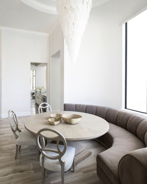 We are loving this custom curved channel back banquette for this gorgeous breakfast nook! The table, the dramatic chandelier, the whole room! #interiordesign #architecture #love #furniture #property #decor #breakfast #interiordesigns #custom #furnishings #residentialdesign #interior444 #luxuryinteriors #customhome #custombuild Round Kitchen Nook, Curved Banquette Seating, Nude Decor, Curved Banquette, Inviting Dining Room, Built In Bench Seating, Diy Window Seat, Banquette Seating In Kitchen, Florida Interior Design