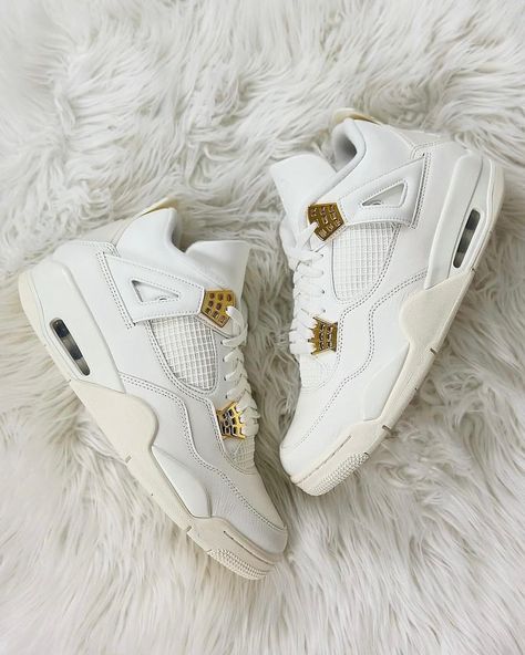 16/03: Jordan 4 Metallic Gold ✨ Released this morning across the UK & EU, Celebrating the 35th year of the Jordan 4 Silhouette in style 🗓️ Flaunting a crisp white leather upper, with signature plastic netting on the sides and forefoot. Metallic gold accents cover the plastic wings, giving the sneaker a fancy makeover. Shop the latest Jordan 4 release via our website now, directly available through our story 💻 📸 cc: @milanomarktplace #TheConnect #Sneakers #Footwear #Fashion #Nike #Jord... Luxury White Air Jordan 4 With Perforations, Luxury Air Jordan 4 Lace-up With Perforations, Luxury Air Jordan 4 High-top Sneakers, Jordan 4 Metallic Gold, Luxury Leather High-top Air Jordan 4, Jordan 4 Metallic, Latest Jordans, Footwear Fashion, Our Story