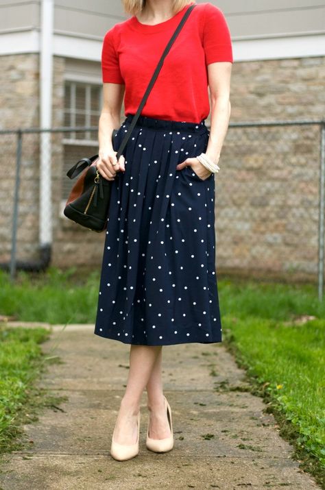 J. Crew polka dot midi skirt, red orange sweater, nude pumps, pearl bracelets, Fossil Sydney satchel Blue Polka Dot Skirt Outfit, Navy Polka Dot Skirt Outfit, Styling A Long Skirt, Polka Dot Skirt Outfit, Dot Skirt Outfit, Polka Dot Midi Skirt, Orange Sweater, Pearl Bracelets, Orange Sweaters