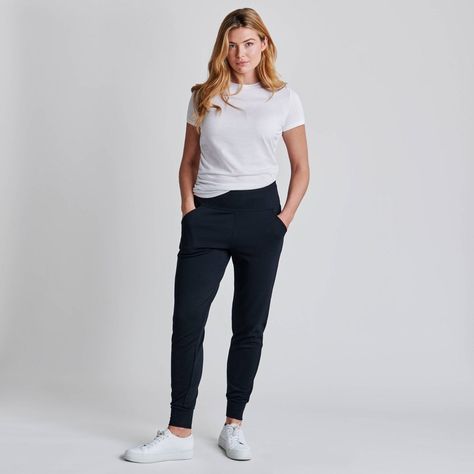 These cool joggers are right on ponte! Made from an ultra-opaque ponte knit to conceal lumps and bumps, this figure-flattering style also features a hidden shaping panel to create a toned tummy. Designed for a sleek, leg-lengthening look that can be dressed up or down! Comfy Clothes Women, Professional Athleisure Outfits, Mom Athleisure Style, Jogger Pants Outfit Casual, Plus Size Workout Outfits, Plus Size Travel Outfits, Athleisure Outfits For Work, Black Joggers Outfit, Best Travel Outfits For Women