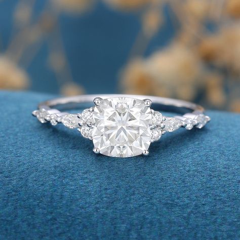 1-21-ct-cushion-shaped-moissanite-cluster-engagement-ring Elegant Engagement Rings White Gold, Engagement Rings Silver Cushion, Simple Cushion Engagement Rings, Cushion Engagement Ring Silver, Cushion Wedding Rings, Halo Engagement Ring Silver, Engagement Rings Cushion Cut, Ring Goals, Sparkly Rings