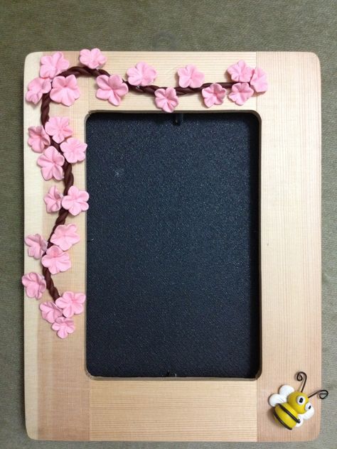 Handmade photo frame with Polymer Clay cherry blossom and a bee! <3 Clay Picture Frames, Clay Photo Frame, Clay Cherry Blossom, Clay Cherry, Flower Photo Frame, Photo Frame Crafts, Handmade Photo Frames, Cultural Crafts, Felt Flowers Diy