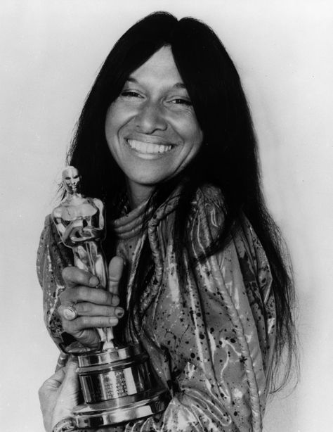 Buffy Sainte-Marie won an Academy Award Oscar in 1983 for Best Original Song, 'Up Where We Belong', from the 1982 film An Officer and a Gentleman. She wrote the music with Jack Nitzsche. The lyrics were written by Will Jennings. Truth Teller, An Officer And A Gentleman, Robbie Robertson, Songs Written, Academy Museum, Cripple Creek, Famous Movie Quotes, Social Activist, Country Song