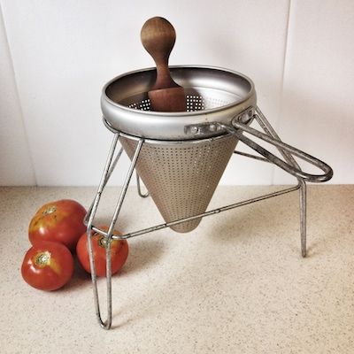 a food mill rig - one of the strangest (yet incredibly useful) kitchen tools out there Cooking Equipment Kitchen Tools, Food Mill, Homestead Kitchen, Canning Food Preservation, Quirky Kitchen, Food Stories, High End Kitchens, Geometric Drawing, Dehydrated Food