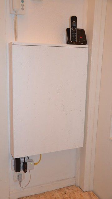 How to Hide Your Router - Router Cabinet: 9 Steps (with Pictures) Router Cabinet, Hide Electrical Cords, Hide Router, Router Box, Magnetic Door Lock, Laying On The Floor, Internet Router, Make A Door, Hide Cables