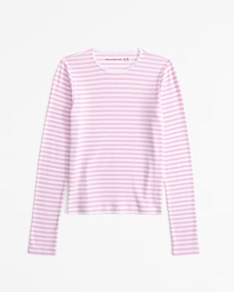 girls essential long-sleeve baby tee | girls new arrivals | Abercrombie.com | Abercrombie & Fitch (US) Low Rise Baggy Jeans, Abercrombie Jeans, Bow Sweater, Fall Jeans, Rib Fabric, Tween Outfits, Abercrombie Kids, Pink Top, Trim Detail