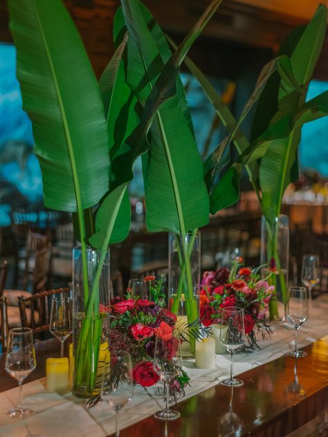 The Centerpieces Garden Table Wedding, Tropical Leaf Centerpiece Wedding, Banana Leaf Centerpiece, Banana Leaf Arrangement, Tropical Leaf Centerpiece, Banana Leaf Table Decor, Unique Ceremony Florals, Tropical Table Scape, Tropical Wedding Food