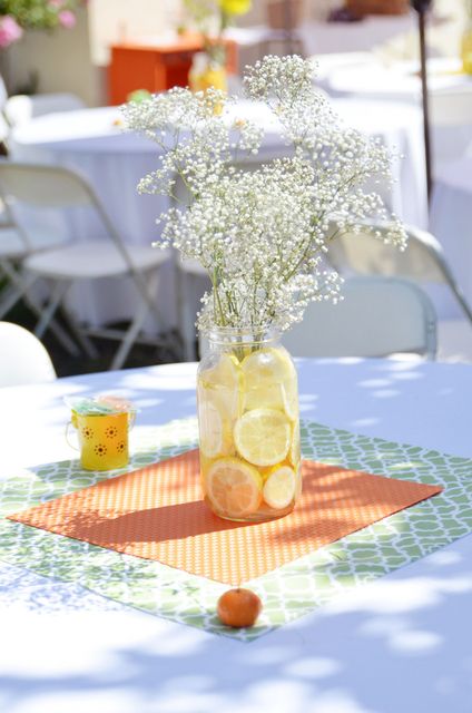 Pretty centerpieces at a Citrus party!  See more party ideas at CatchMyParty.com! Bbq Baby Shower Decorations, Country Wedding Centerpieces, Baby Q Shower, Baby Shower Yellow, Outdoor Baby Shower, Green Baby Shower, Baby Shower Bbq, Sprinkle Baby Shower, Baby Shower Party Ideas