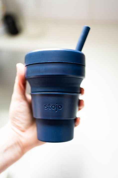 Are Stojo water bottles, bowls, and coffee cups worth it? See my honest reviews of these reusable, collapsible containers. Collapsible Containers, Collapsible Bowl, Collapsible Water Bottle, Spilled Coffee, Tiny Spaces, Reusable Cup, Stainless Steel Cups, Homemade Cookies, Sustainable Gifts