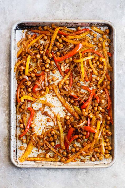 Vegetarian sheet pan fajitas that are powered by colorful bell peppers and chickpeas. A gluten-free, sheet pan meal that is ready in under thirty minutes. #sheetpanfajitas #vegetarianfajitas #veganfajitas Vegetarian Sheet Pan, Veggie Sheet Pan, Roasted Kohlrabi, Sheet Pan Fajitas, Pan Fajitas, Vegetarian Fajitas, Vegan Fajitas, Maple Roasted Carrots, Fajita Vegetables