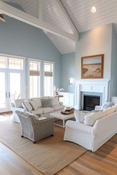 16 Living Room Paint Colors That'll Make You Rethink Your Whole Vibe Beach Color Palette Living Room, Powder Blue Walls Living Room, Topsail Sherwin Williams Living Room, Whole House Blue Paint Scheme, Coastal Living Room Paint Color Ideas, Light Blue Paint Colors For Living Room, Blue Paint Living Room Ideas, Lakehouse Living Room Ideas, Beach House Colors Interior Walls