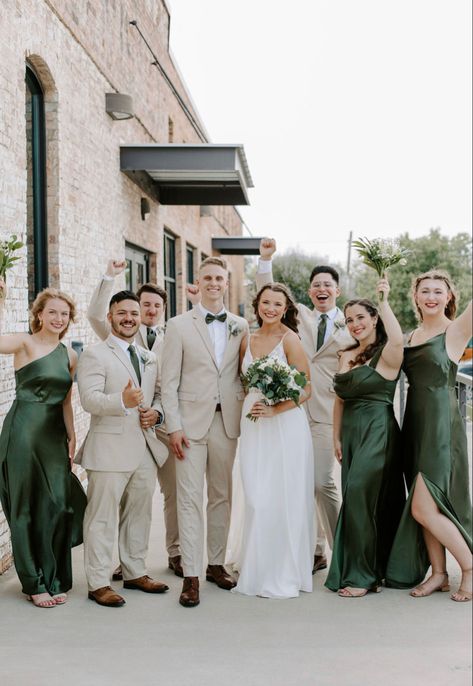 Green Suit Champagne Tie, Green And Gold Wedding Party Attire, Tan And Emerald Green Suit, Tan Suit With Green Bow Tie, Khaki Green Wedding, Bridesmaid And Groomsmen Pictures Green, Green Bridesmaids With Groomsmen, Eucalyptus Wedding Suit, Eucalyptus Wedding Party Groomsmen