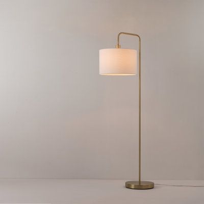 Illuminate your space in contemporary style with this 58" arched floor lamp. Crafted of metal, this floor lamp strikes a streamlined arched silhouette on a round pedestal base. Up top, a fabric drum shade ensconces one 60 W incandescent E26 medium base bulb (not included) to diffuse bright light as it’s dispersed throughout your space. Powered by a 60" length of electric cord, this lamp is operated by a simple rotary socket. Base Finish: Satin Gold | Ebern Designs Chattahoochee 58" Arched Floor Nursery Floor Lamp, Gold Floor Lamp, Floor Lamps Living Room, Arched Floor Lamp, Bamboo Shades, Smart Bulb, White Floor Lamp, Modern Floor, Brass Floor Lamp