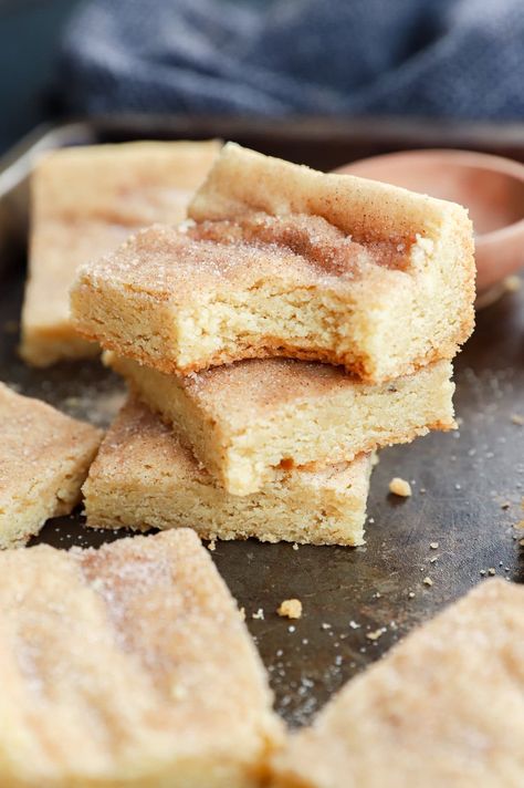 Soft and chewy snickerdoodle bars give you everything you want out of a snickerdoodle cookie, but with a much easier process! Topped with cinnamon sugar, this easy one-pan dessert skips the rolling and chilling with sacrificing flavor. Snickerdoodle Pan Cookies, Snickerdoodle Bars Soft And Chewy, Snickerdoodle Bar Cookies, Snickerdoodle Bars 9x13, Snickerdoodle Cookie Bars, Snickerdoodle Bars Recipe, Snickerdoodle Blondies, Snickerdoodle Cake, Snickerdoodle Bars