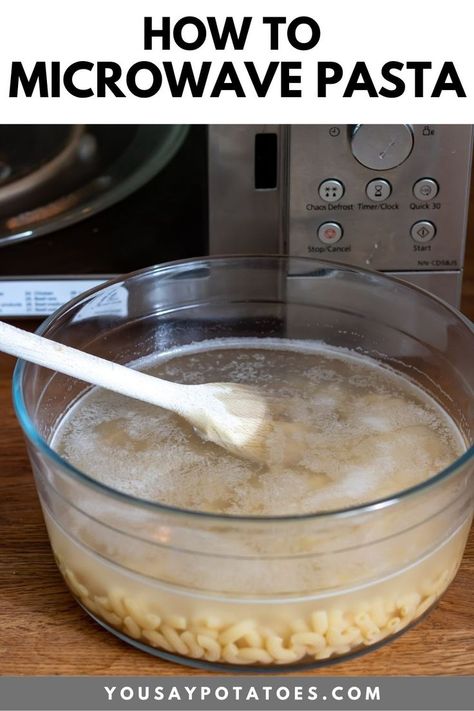 Bowl of pasta cooking in a microwave.