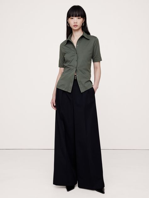 This timelessly tailored button-down top is cut from our silky cotton jersey—a fabric we love for its beautiful drape and dressed-up look.  Semi fitted.  Point collar and  button front.  Straight hem.  Semi fitted.  Elbow-length sleeves.  Above-hip length.  Model: Size S, 5'10" (178cm). Minimal Goth, Mom Wardrobe, Autumn Clothes, Elbow Length Sleeve, Girly Girl, Hip Length, Womens Clothing Tops, Women Clothes Sale, Banana Republic