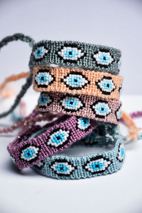 Pastel friendship bracelets with evil eye motif Evil Eye Friendship Bracelet, Selling Bracelets, Eye Glitter, Handmade Friendship Bracelets, Friendship Bracelet, Evil Eye, Blue Eyes, Embroidered Friendship Bracelet, Friendship Bracelets