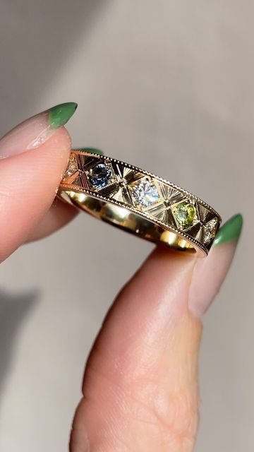 Kindred Lubeck ✦ Artifex Fine Jewelry on Instagram: "I can’t wait to tell you the significance of the color scheme behind my latest custom wedding band. ‌ But here’s a hint: 🦔 ‌ #weddingrings #uniqueweddingrings #handengravedweddingring #handengravedjewelry" Artifex Fine Jewelry, Colorful Wedding Band, Kindred Lubeck, Art Nouveau Wedding Band, Unique Gold Wedding Bands, Promise Ring Ideas, Hand Engraved Jewelry, Wax Seal Ring, Graduation Ring