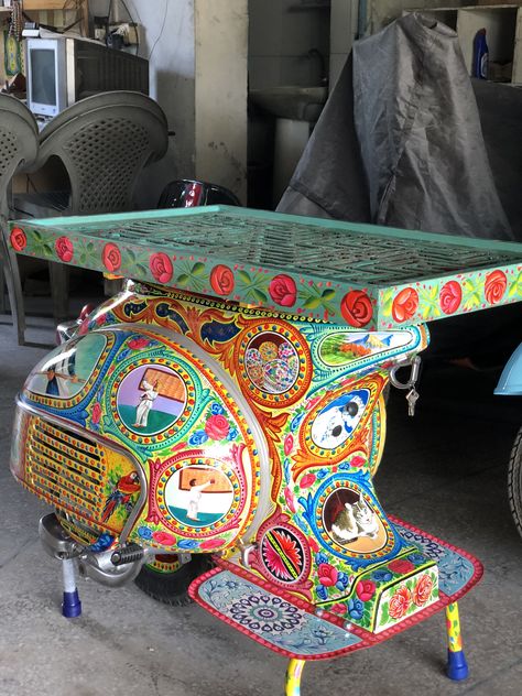 1962 Vespa VBB 150cc chopped in half, Pakistani truck art paint job and table top upcycled using an old jailey screen. Work done by Vintage Vespa in Islamabad, I-10. Old Scooter Decor Ideas, Scrap Furniture, Pink Truck Accessories, Scooter Garage, Pakistani Truck Art, Truck Art Pakistan, Vespa Vbb, Pakistani Truck, Truck Tattoo