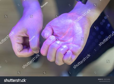 Hands under black UV light to detect glow in the dark germs around nails and fingerprint as visual tool for teaching proper handwashing, aseptic techniques, and general infection controldark#glow#germs#fingerprint Around Nails, Uv Light, Graphics Design, New Pictures, Royalty Free Photos, Fingerprint, In The Dark, Glow In The Dark, Royalty Free Stock Photos