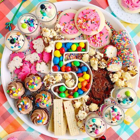 Today, we’re making a Birthday Grazing Board! This is the treat board of any birthday guy or gal’s dreams. It’s loaded with sweets, treats, and all the sprinkles. And honestly, what more could anyone want on their birthday. And bonus, as with any good grazing board, you can store buy or home make the components of the board making the assembly of this board as easy or as complex as you so choose. Iced Animal Crackers, Birthday Popcorn, Pineapple Smoothie Recipes, Brownie Brittle, Nothing Bundt Cakes, Grazing Board, Instant Pudding Mix, Snack Board, Pineapple Smoothie