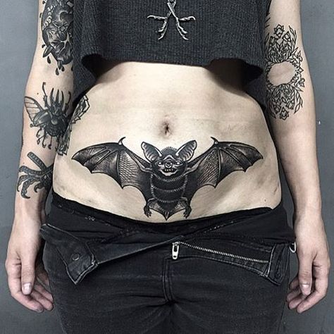 By @morristattooer Tattoo Bat, Pelvic Tattoo, Bats Tattoo, Batman Tattoos, Pelvic Tattoos, Bat Tattoos, Coffin Tattoo, Lower Stomach Tattoos, Tiny Designs