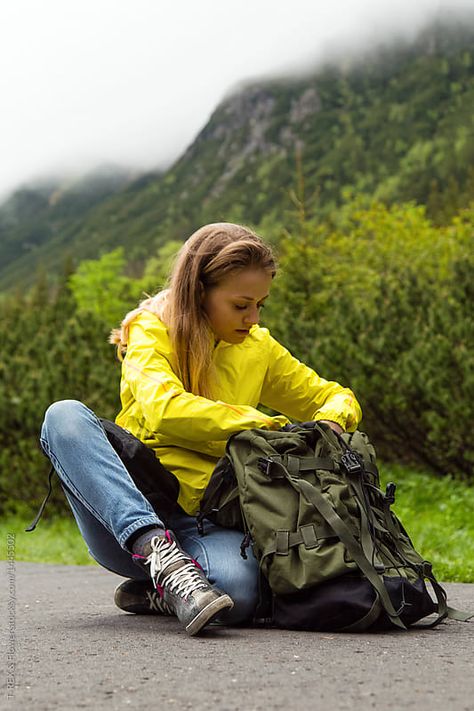 Woman sitting and searching in backpack by T-REX & Flower for Stocksy United Holding Backpack Reference Drawing, Backpack Pose Reference Drawing, Person With Backpack Reference, Person Wearing Backpack, Backpack Pose Reference, Holding Backpack Reference, Backpack Pose, Pose With Bag, Walking With Backpack