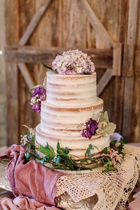 nearly naked wedding cake with purple flower topper Thanksgiving Decorations Diy Table, Shabby Chic Wedding Cake, Thanksgiving Dinner Table Decorations, Thanksgiving Decorations Outdoor, Rustic Shabby Chic Wedding, Purple Wedding Decorations, Purple Wedding Cakes, Thanksgiving Dinner Table, Thanksgiving Decorations Diy