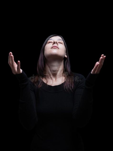 Mourning woman praying, with arms outstretched in worship to god stock photos Pose Arms Outstretched, Woman Arms Outstretched, Woman With Arms Outstretched, Praying Reference, Praying Pose Reference, Nun Cosplay, Woman Looking Down, Cosplay Poses, Fish Board