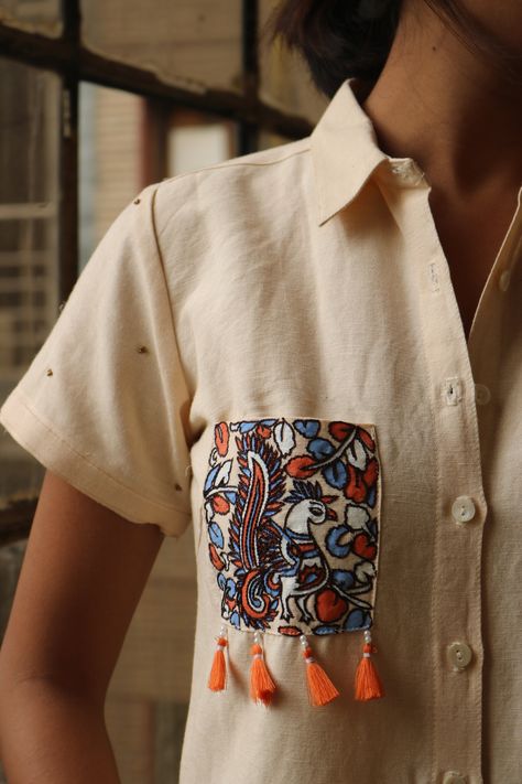 "Linen top for women, Cream linen top, women shirt, made to order, custom made, plus sizepaint Hand painted and embroidered linen top. This shirt is perfect for the summer! -Model height: 5'3\" wearing size S -Kalamkari painting and embroidery on pocket -Top length: 21\" -Short sleeves -Hand painted -Hand embroidered -Pocket embroidery and tassles -Closure: Front shell buttons" Luxury Cotton Tops For Summer, Cheap Printed Cotton Tops, Artistic Cheap Tops For Women, Cheap Playful Cotton Tops, Beautiful Blouses For Women Patch Work, Luxury Cotton Tops With Graphic Design, Short Tops For Women In Cotton, Tops For Women Shirts, Luxury Cotton Tops With Back Print