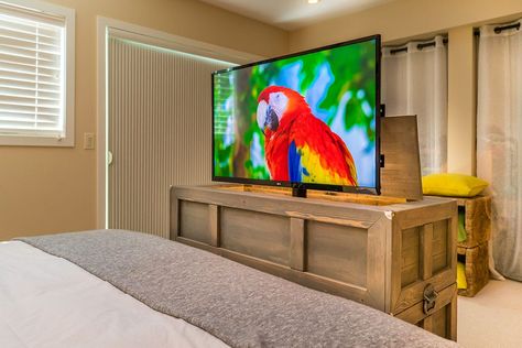 Foot of the Bed TV Cabinet - Movable Spaces Tv At Foot Of Bed, Foot Of Bed Ideas, Hidden Tv Cabinet, Bed Tv, Lift Desk, Environmentally Friendly Living, Space Tv, Hidden Tv, Portable Display