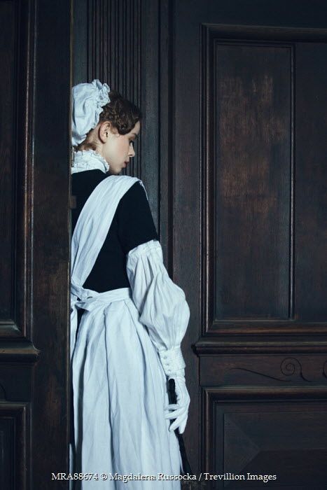 Magdalena Russocka VICTORIAN MAID IN UNIFORM BY DOORS IN HOUSE Women Victorian Maid, Era Victoria, Victorian Aesthetic, Maid Cosplay, Maid Outfit, Human Poses Reference, Human Poses, Wow Art, Pose Reference Photo