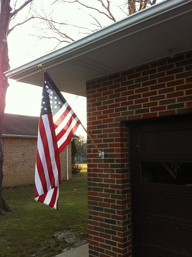 Old glory isn't going anywhere now!  Good info on how to hang a flag on brick.. Flag On House Exterior, Hanging Flag On House, Flag Placement On House, Flag Pole On House, Flag Pole Ideas Diy, American Flag On House, Flag On House, Brick Porch, Eagle Project