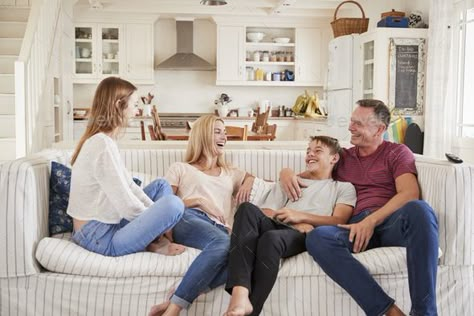 Family With Teenage Children Relaxing On Sofa Together by monkeybusiness. Family With Teenage Children Relaxing On Sofa Together#Children, #Teenage, #Family, #monkeybusiness Traditional Living Room Wall Decor, Family Photoshoot With Teenagers, Family Hurts You, Mother Relationship, Family In Home, Family Photos 2023, Family Estrangement, Family Conversation Starters, Home Photo Ideas