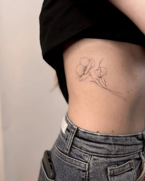 Very delicate poppies according to an individual sketch 🤍 Do you find poppies beautiful? Poppy Vine Tattoo, Daisy And Poppy Tattoo, August Birth Flower Tattoo Poppies, Tattoo Poppy Flower, Fine Line Poppy, Poppy Sketch, Flower Booth, Upper Thigh Tattoos, Flower Tat