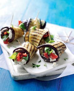 For a quick vegetarian recipe, wrap charred slices of aubergine in feta and yogurt marinade to make these rolls. Aubergine Rolls, Vegetarian Canapes, Easy Dinner Party Recipes, Marinated Feta, Aubergine Recipe, Canapes Recipes, Quick Vegetarian Meals, Delicious Magazine, Dinner Party Recipes