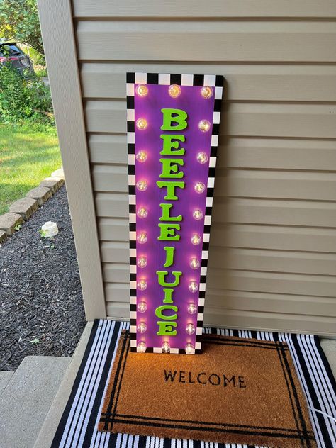 Beetle Juice Halloween Sign. This absolute show stopper comes with 24 G40 lights and is sure to have you ready for spooky season! Can be used at your front door, as a porch leaner, entryway decor or for any Beetlejuice themed party this year.  Height is approximately 44".  Please note this item is handmade to order and size may differ by up to 1 inch. All sales to Alaska will be charged a shipping fee, this is due to the high shipping rates. RETURNS We do not accept returns but please notify us Its Showtime Beetlejuice Sign, Lamp Post Halloween Decor, Beetle Juice Office Decorations, Beetle Juice Sign, Beetlejuice Door Sign, Beetlejuice Porch Decor, Beetlejuice Door Decor, Bettle Juice Trunk Or Treat, Beetlejuice Front Porch