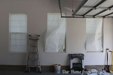 how to bug proof garage windows, garages, window treatments, windows, We started by removing our crappy paper shade Garage Windows, Linen Closet Storage, Garage Update, Painted Baskets, Window Inserts, Window Well, Concrete Lamp, Painted Chairs, Window Insulation