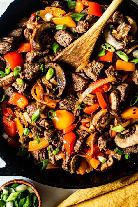 One Skillet Beef Tips with Peppers and Onions - ghee/avocado oil (might reduce), sirloin steak, salt, black pepper, ACV, garlic cloves, red bell pepper, orange bell pepper, yellow onion, sliced baby bella mushrooms, green onion (for garnish) Beef Tips Healthy, Recipe For Beef Tips, Green Peppers And Onions, Crock Pot Beef Tips, Beef Tip Recipes, Crock Pot Beef, Easy Whole 30 Recipes, Steak And Mushrooms, One Skillet Meals